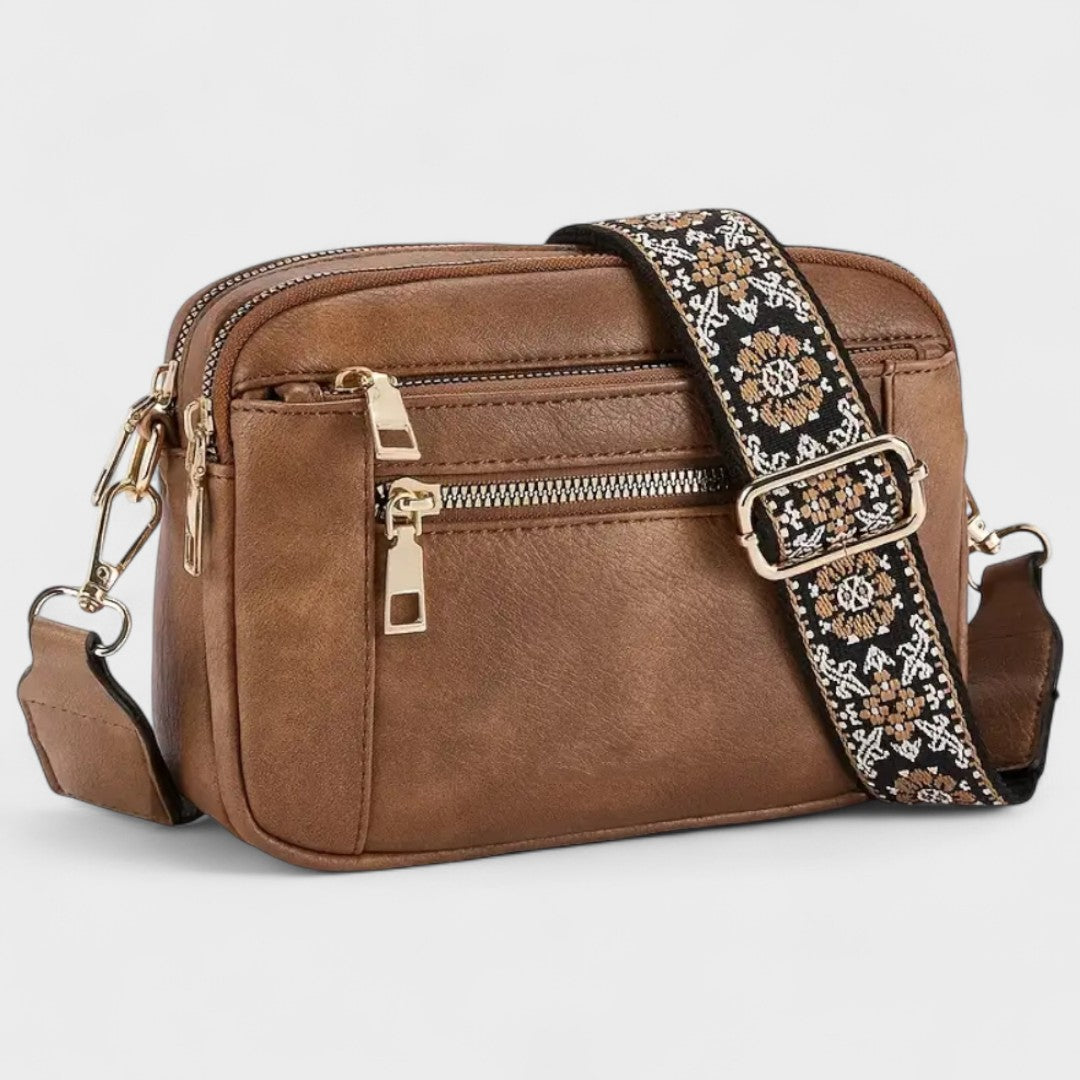 Olivia - Bolso bandolera con correa estampada