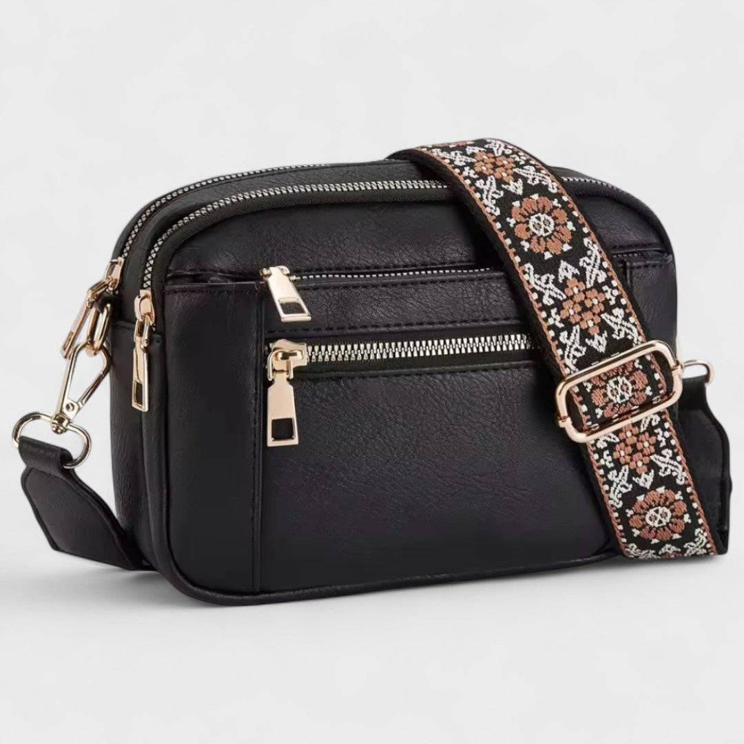 Olivia - Bolso bandolera con correa estampada