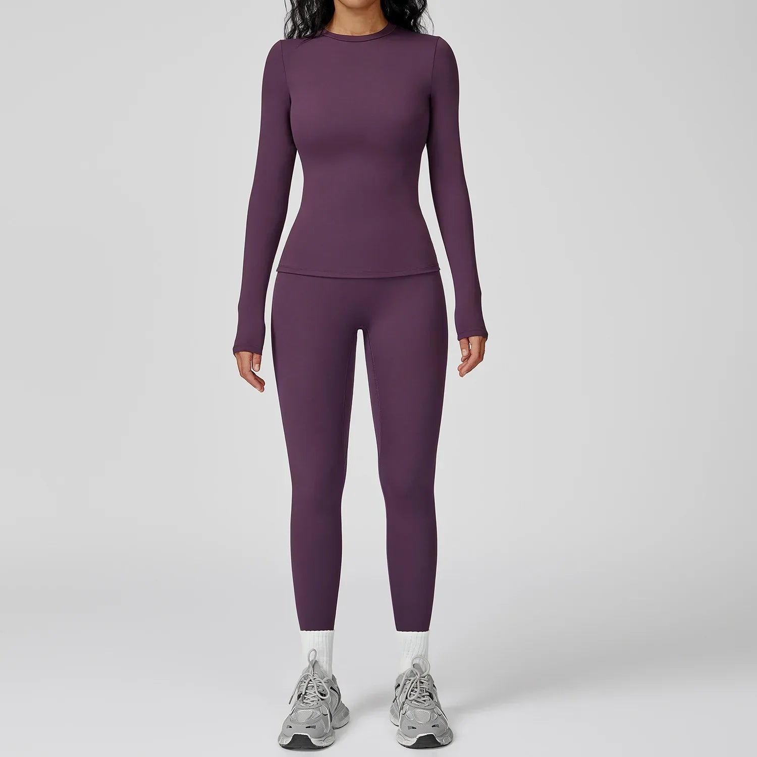 Traje deportivo con leggings y manga larga