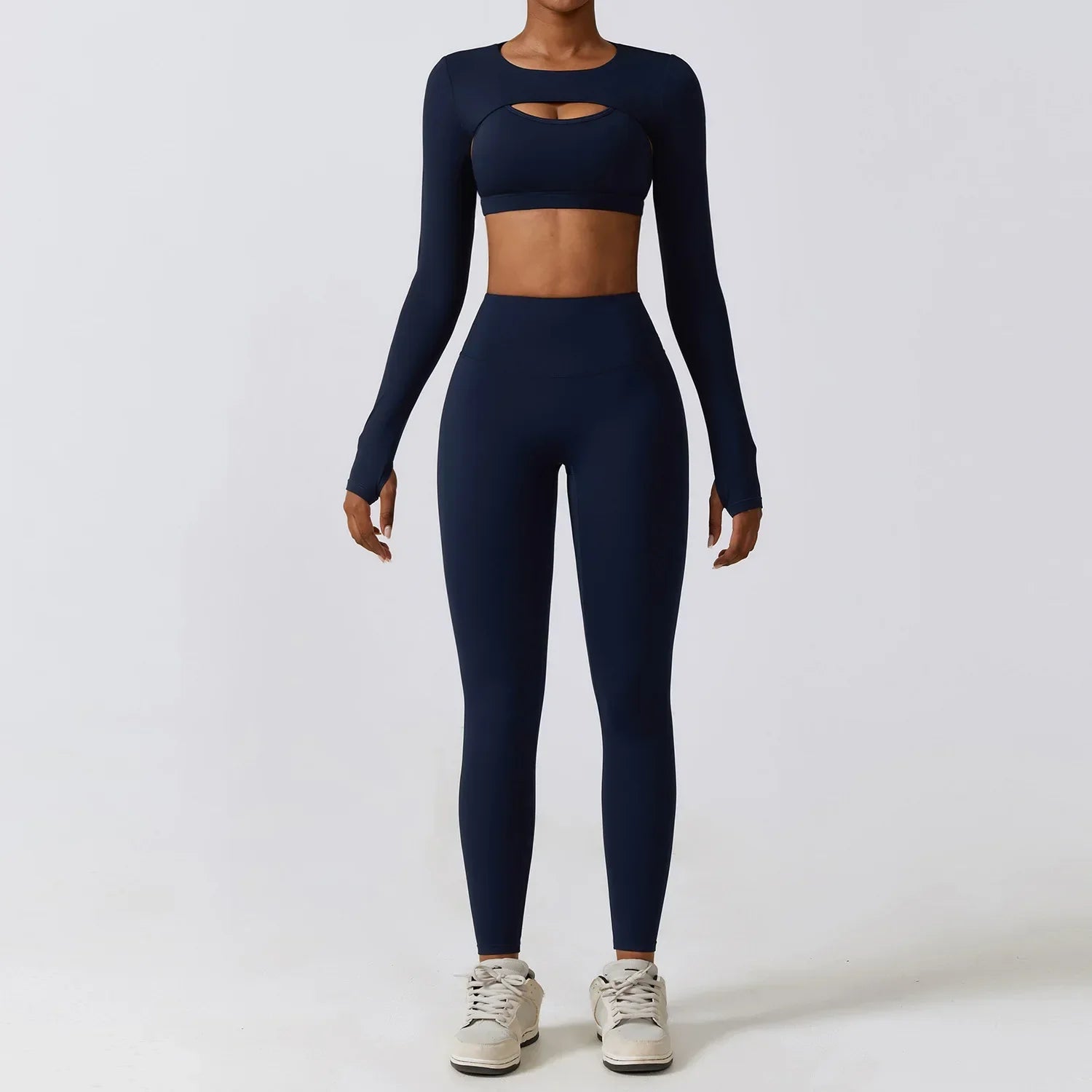 Conjunto deportivo con crop top y chaleco