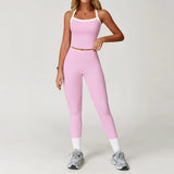 Conjunto deportivo con leggings y ribete blanco