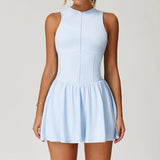 Vestido deportivo con cremallera y pantalones escondidos