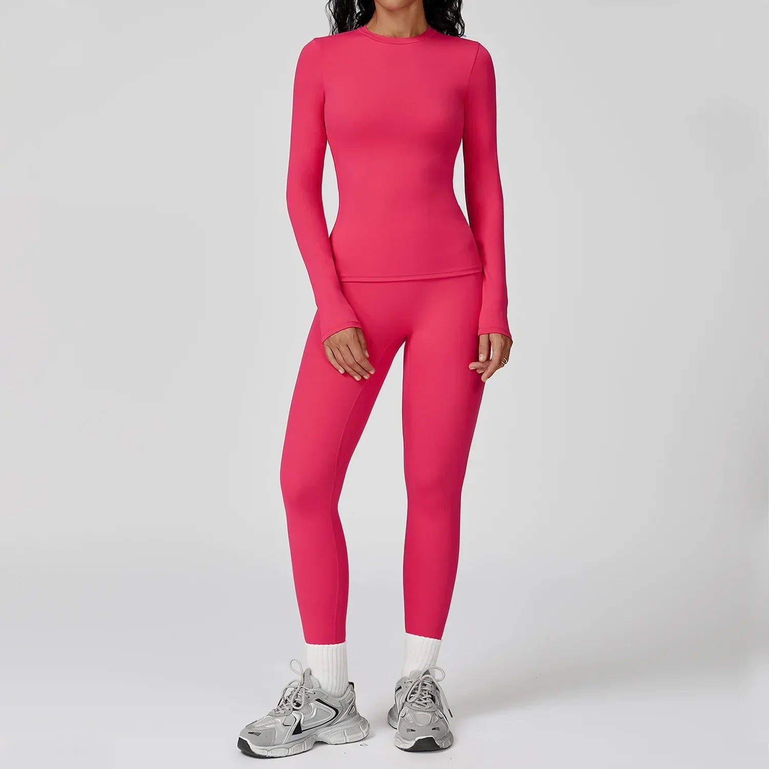 Traje deportivo con leggings y manga larga