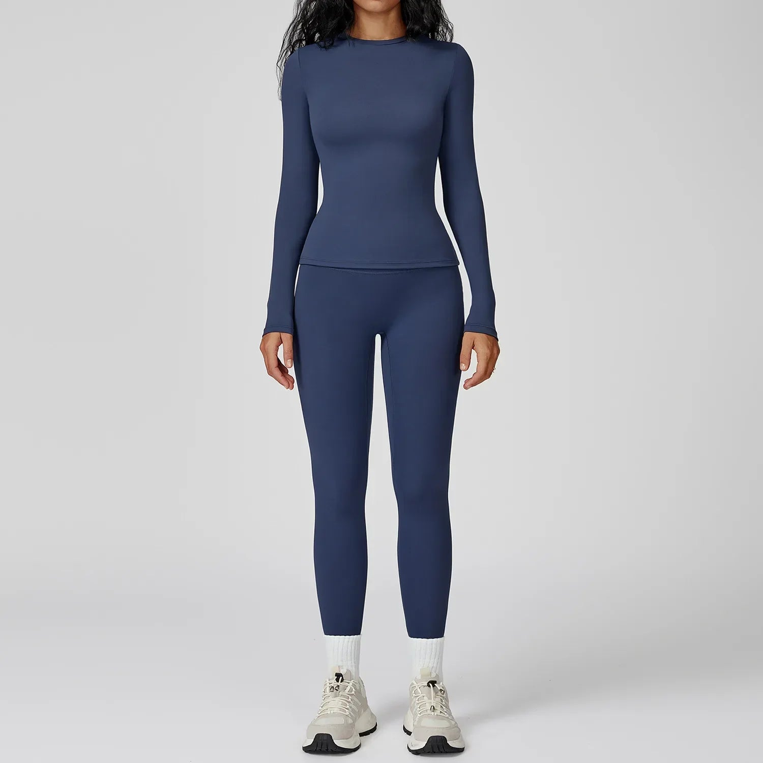Traje deportivo con leggings y manga larga