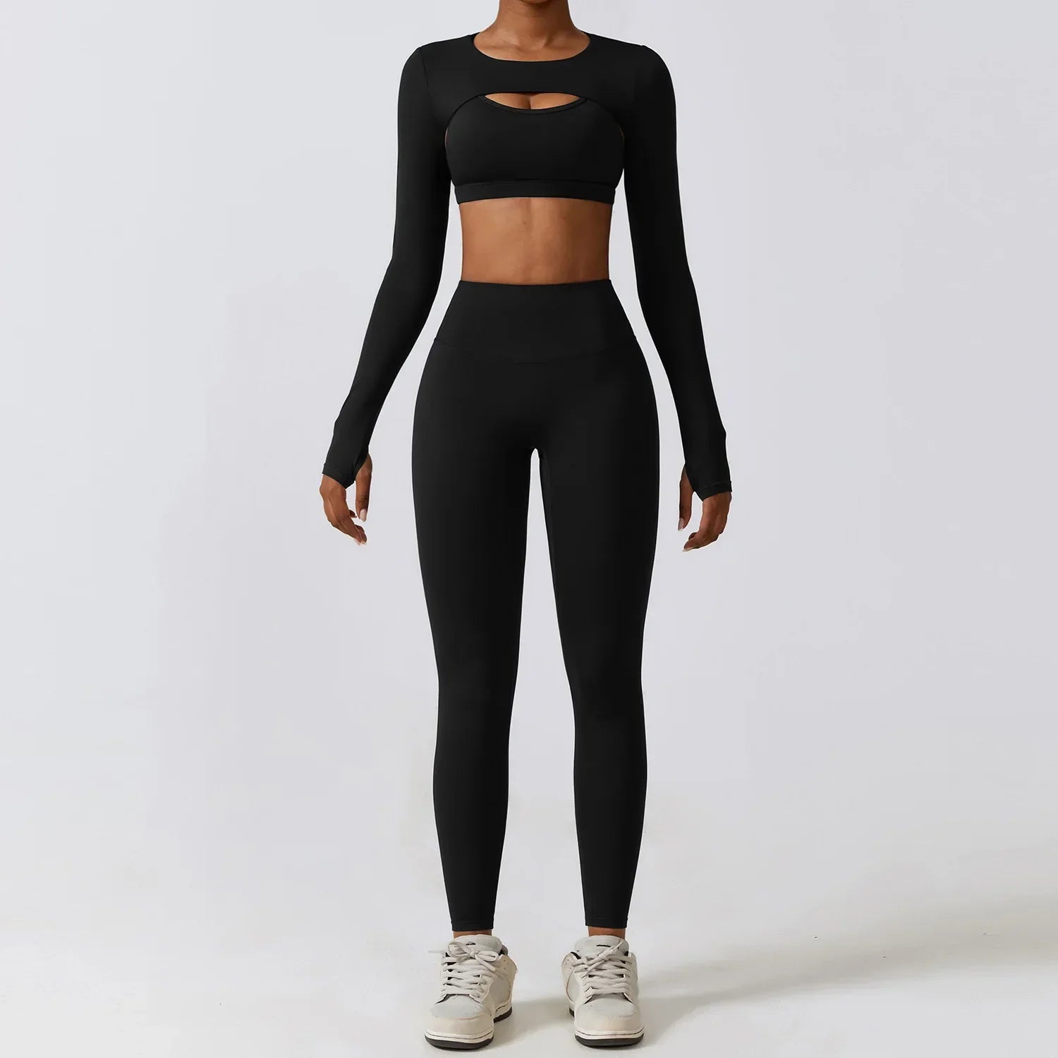Conjunto deportivo con crop top y chaleco