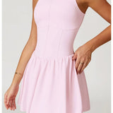 Vestido deportivo con cremallera y pantalones escondidos